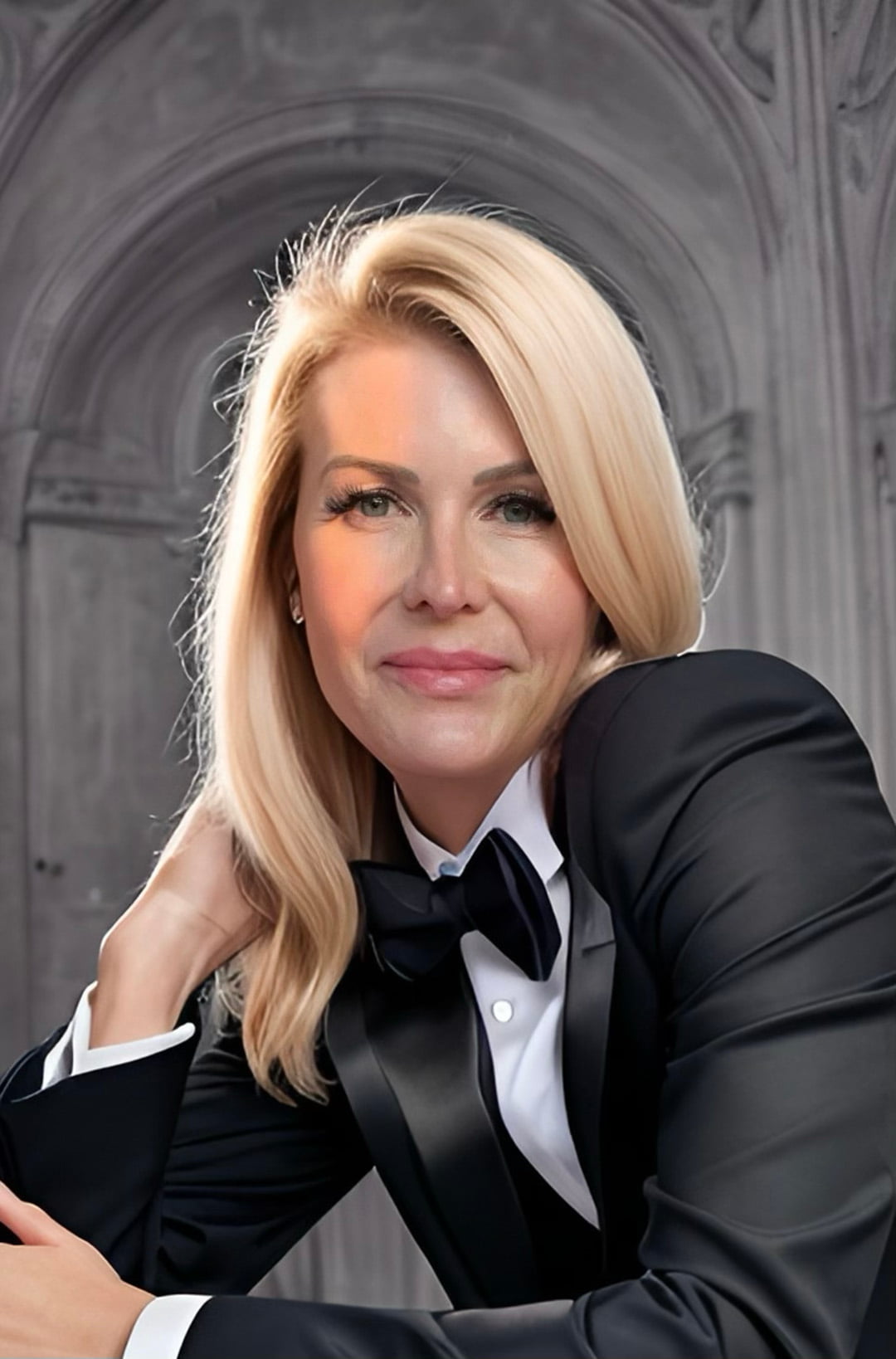 Chezzi Denyer in a black tuxedo